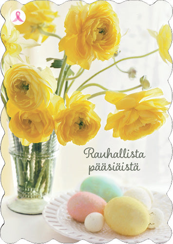 Keltaisia kukkia lasimaljakossa, pääsiäismunia lautasella